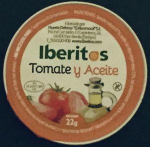 Tarrina de tomate y aceite marca Iberitos. Circular y metálica de 22 gramos