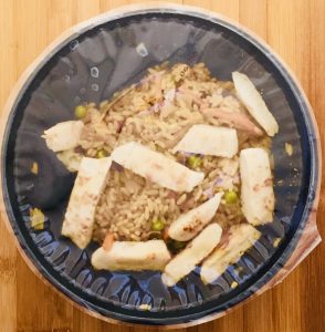 Envase plástico del Chop Suey.Menú precocinado para el Año Nuevo Chino.