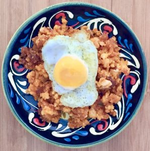 Migas con huevo de codorniz trufado.